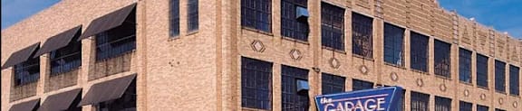 A large building with a sign that says Capage.
