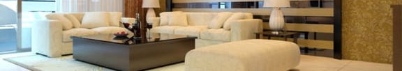 a living room with a couch and a table