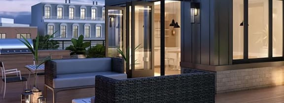 a rendering of a terrace with chairs and a table