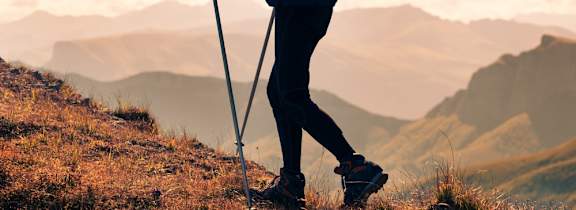 A person hiking on a mountain trail at Ascent on Spence, Tempe