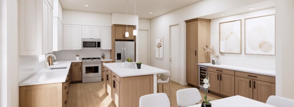 an open kitchen and dining room with a table and chairs