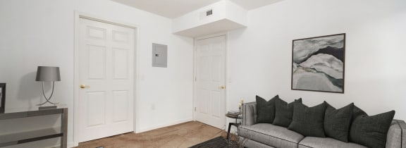 a living room with a couch and a coffee table