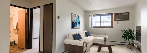 Bismarck, ND Eagle Sky II |a living room with a couch and a table
