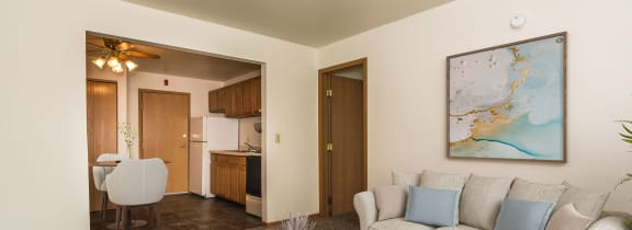 Grand Forks, ND Amberwood Court | a living room with a couch and a coffee table