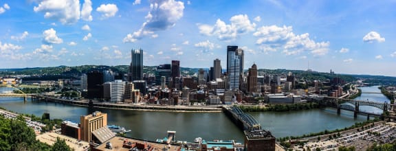 a view of the city from above the river