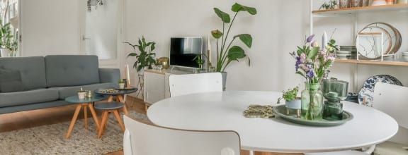 Living room with a table and a couch in it  at Four Corners, Everett, WA