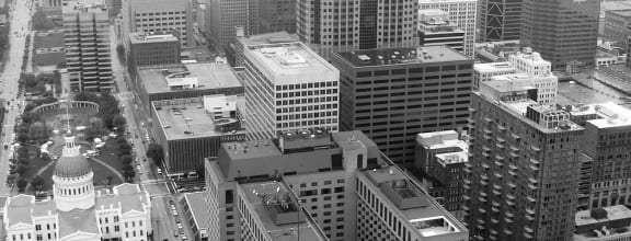 a view of a city from the top of a skyscraper