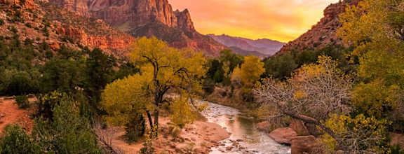a view of a river flowing through a canyon