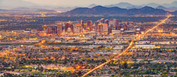 a view of the downtown phoenix skyline at dusk