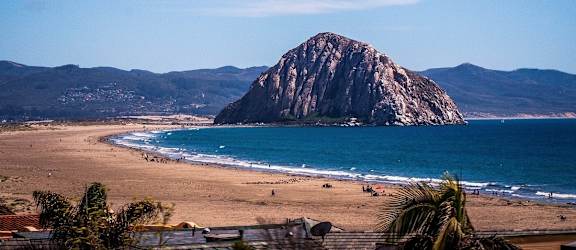 a view of the haystack rock in canon beach