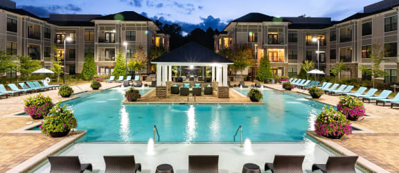 The Juncture Apartments resort-style pool with surrounding sundeck