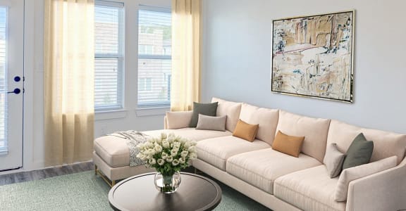 a living room with a white couch and a round table