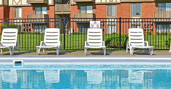 Pool With Sunning Deck at Grand Bend Club Apartments, Grand Blanc