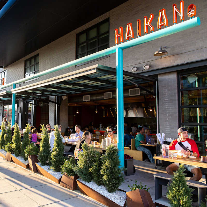 Friends gathered for a meal at a Shaw neighborhood restaurant