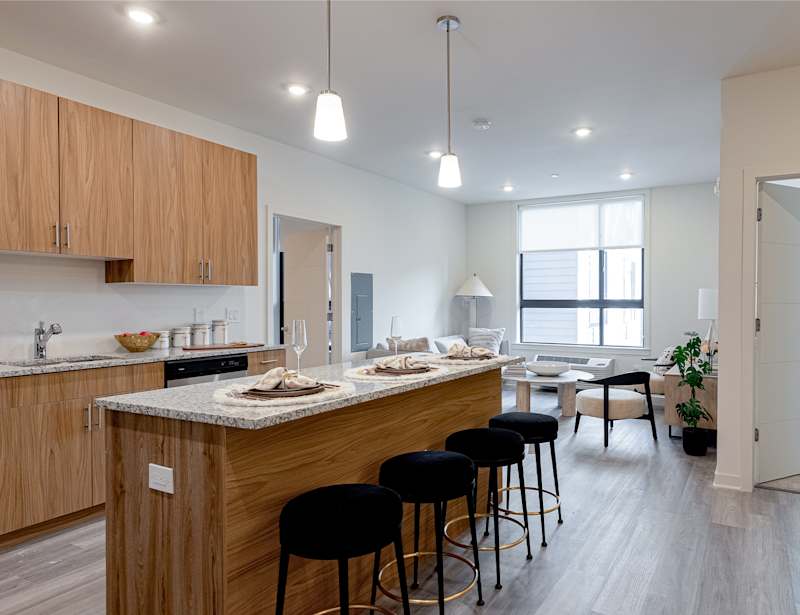 Kitchen with island in a residence at The Botanic