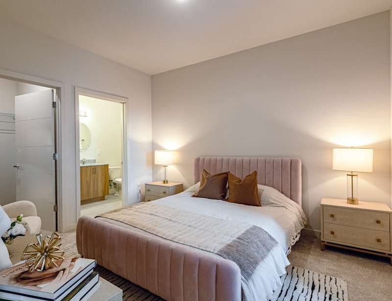Primary bedroom with ensuite bathroom at The Botanic
