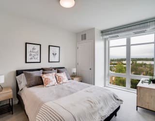 Large Floor to Ceiling Windows in Bedroom