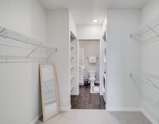 Large Walk-In Closet with Built-In Shelving