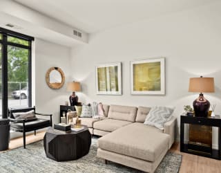 Living Room With Oversized Windows And Doors at The Hill Apartments, Minnesota, 55102