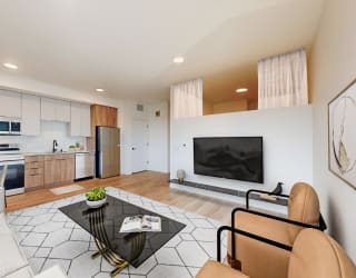 a living room with a couch and a table