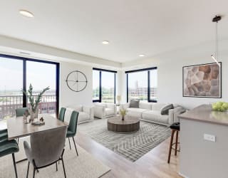 a living room with a couch and a table