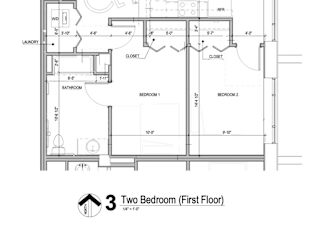A drawing of a two bedroom first floor apartment.