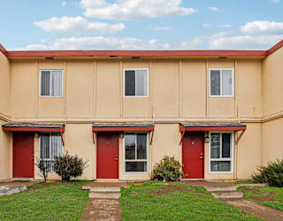 A building with red doors and windows.