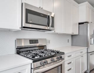 Matching stainless steel appliances in the kitchen of a luxury apartment home at Aspire at CityPlace in Woodbury, Minnesota