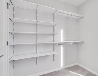 Large walk-in closet with plenty of shelving and hanging space at Aspire at CityPlace in Woodbury, Minnesota