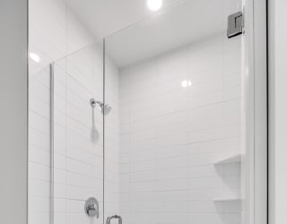 Large shower with glass door at Aspire at CityPlace in Woodbury, Minnesota