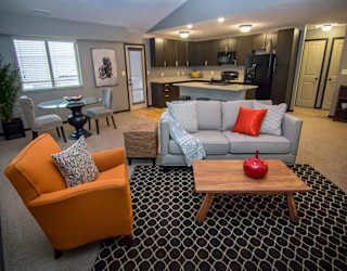 Open floorplan with spacious living room at The Flats at 84 in southeast Lincoln NE 68516