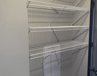 Spacious walk-in closet with shelving in peace floorplan at Haven at Uptown