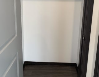 Empty coat closet in a two-bedroom apartment at Haven at Uptown