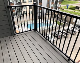 balcony overlooking community swimming pool at Haven at Uptown in Lincoln Nebraska