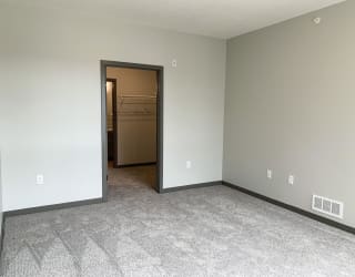 large bedroom with walk in closet at haven at uptown in lincoln nebraska