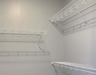 Large walk in closet with plenty of shelving space at Haven at Uptown