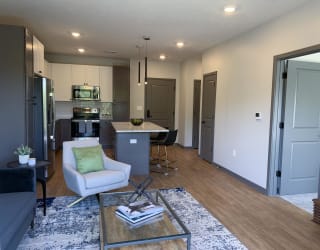 Open concept living area with ample room and sunlight in the Bliss floor plan at Haven at Uptown in Lincoln.