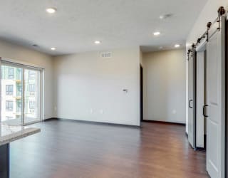 Spacious living-dining space at Haven at Uptown in Lincoln, NE