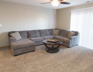 a living room with a couch and a coffee table