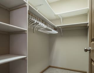 Walk in closet at Stone Creek Villas Apartments