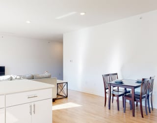 a living room with a couch and a table