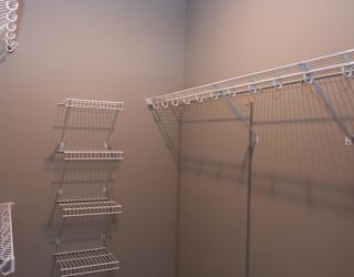 Wire shelving in a walk-in closet