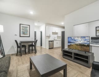 Living room of studio apartment for rent at The Conrad near UNMC in Omaha NE