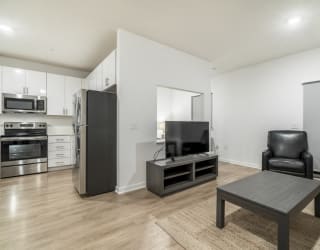 Studio apartment for rent with view of living room and kitchen in contemporary design near UNMC Omaha