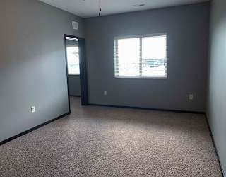 Large bedroom with walk in closet in a 1 bedroom apartment for rent at The Flats at 84 best apartments Lincoln NE 68516