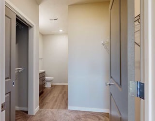 an attached walk-through closet and bathroom
