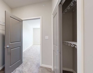 a walk-through closet attached to the primary bedroom