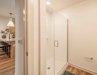 A white bathroom with a toilet and a sink.
