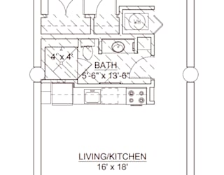 A floor plan of a small apartment with a bedroom, bathroom, living/kitchen area, and loft storage.
