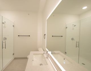 Primary bathroom in the C4 two bedroom two bathroom floor plan at The Mera in St. Louis Park, Minnesota